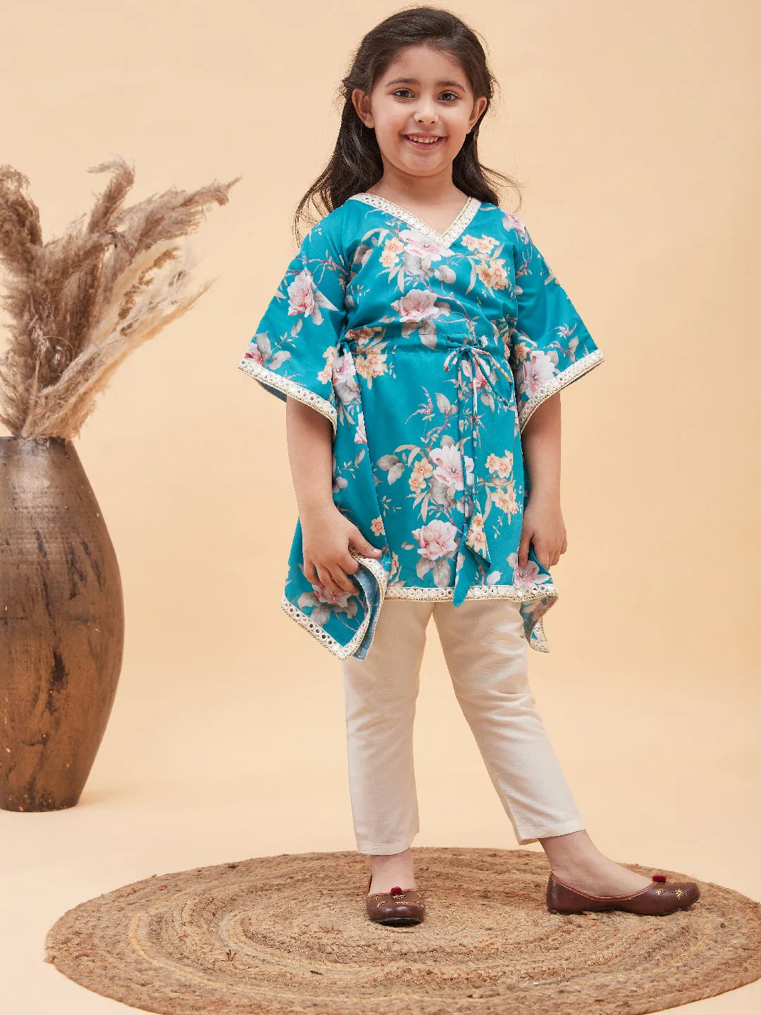 VASTRAMAY Girls Turquoise Blue Floral Printed Kaftan Kurta With Cream Pant Set