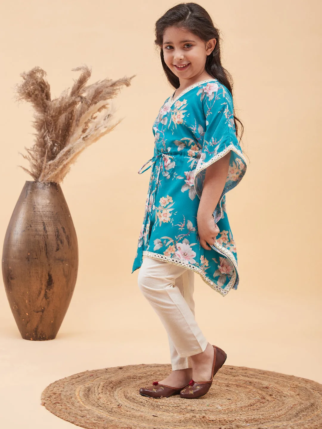 VASTRAMAY Girls Turquoise Blue Floral Printed Kaftan Kurta With Cream Pant Set