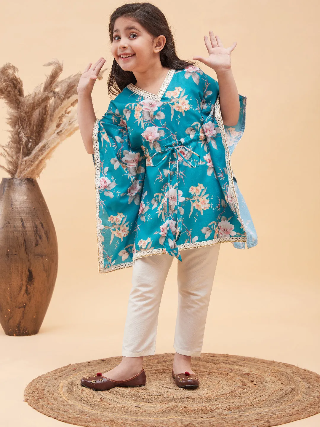 VASTRAMAY Girls Turquoise Blue Floral Printed Kaftan Kurta With Cream Pant Set