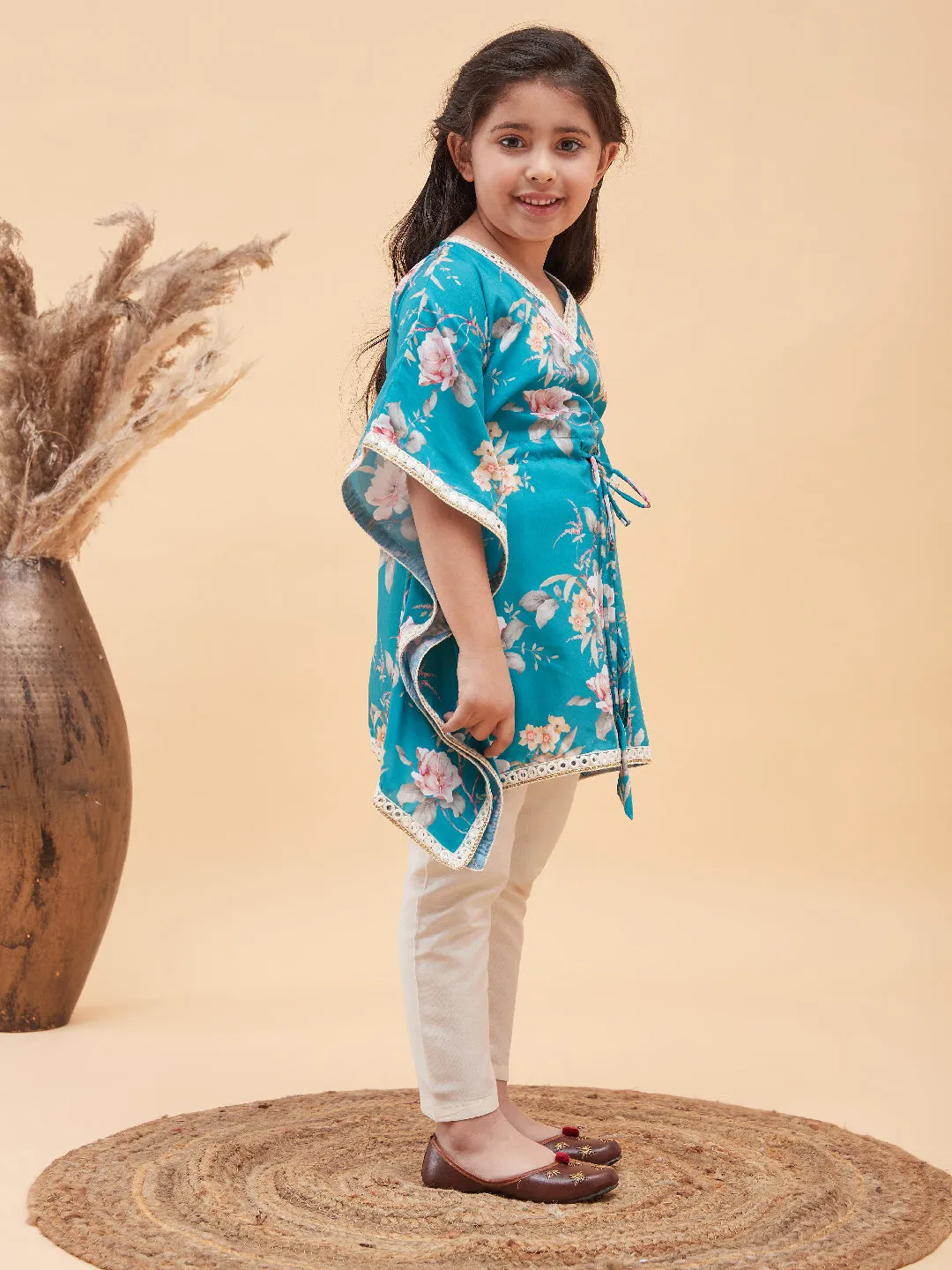 VASTRAMAY Girls Turquoise Blue Floral Printed Kaftan Kurta With Cream Pant Set