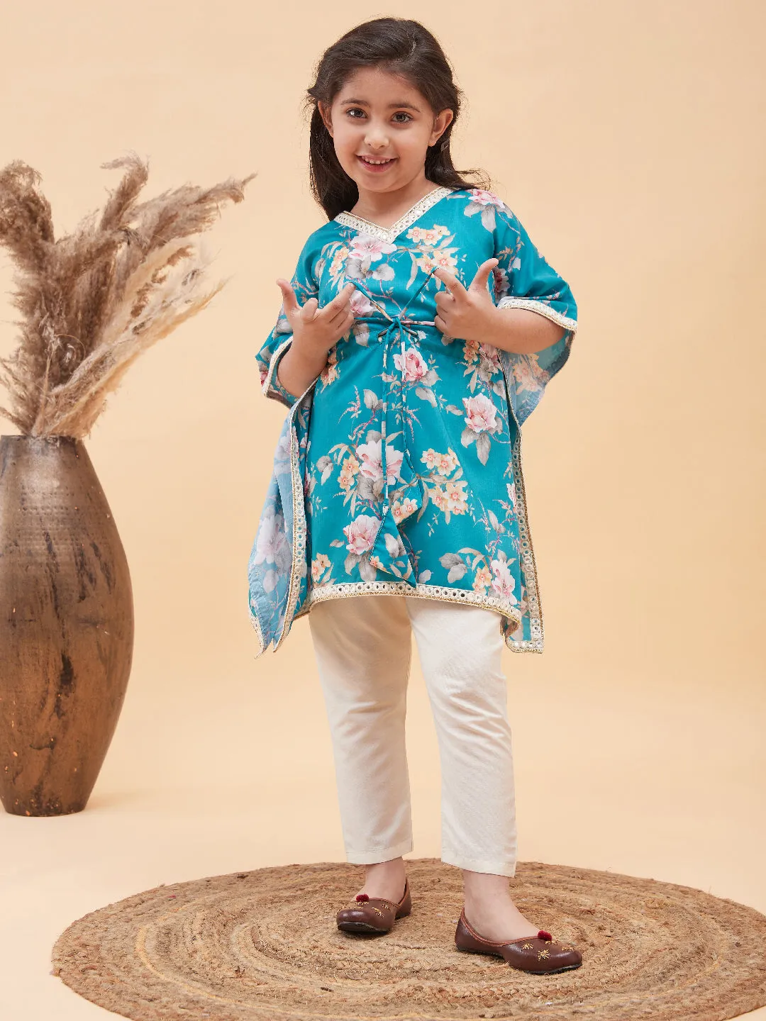 VASTRAMAY Girls Turquoise Blue Floral Printed Kaftan Kurta With Cream Pant Set